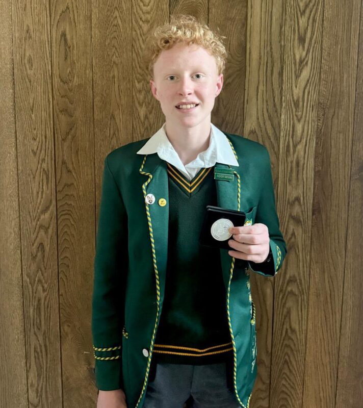 Henning Bouwer showcases his silver medal from the 2026 Hubert van der Spuy National Music Competition at home. Photo: Xoliswa Zakwe