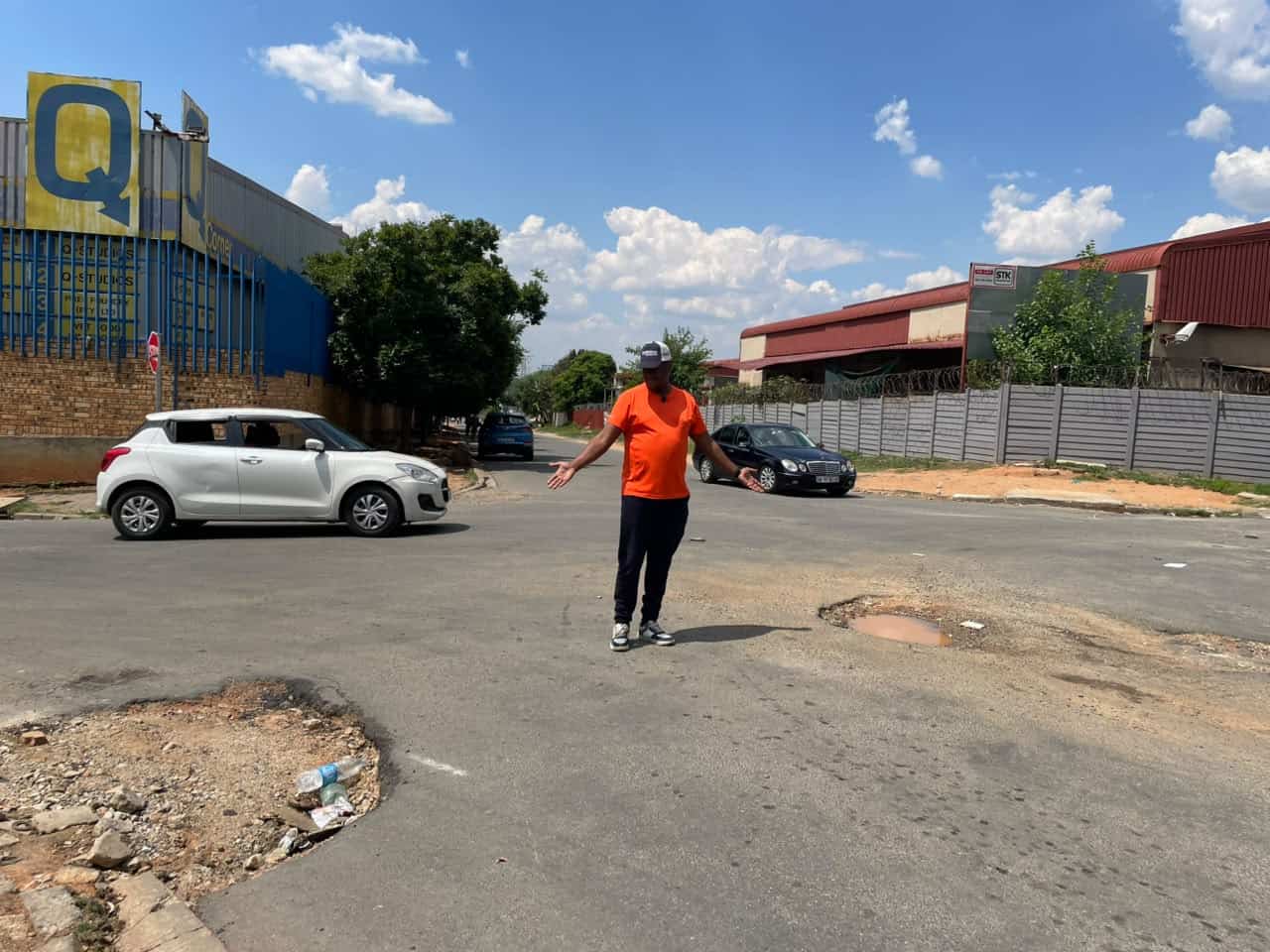 Kew intersection hit by recurring potholes as blocked drains overflow ...