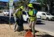 Sive Soul and Mike Ncube clear weeds along Winnie Mandela Drive during the Better Bryanston clean-up on October 23, 2026.