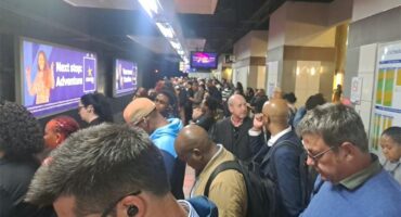 Description: Commuters crowd the concourse at Gautrain Sandton Station amid concerns that recurring escalator failures are contributing to congestion during peak travel periods. Photo: Supplied