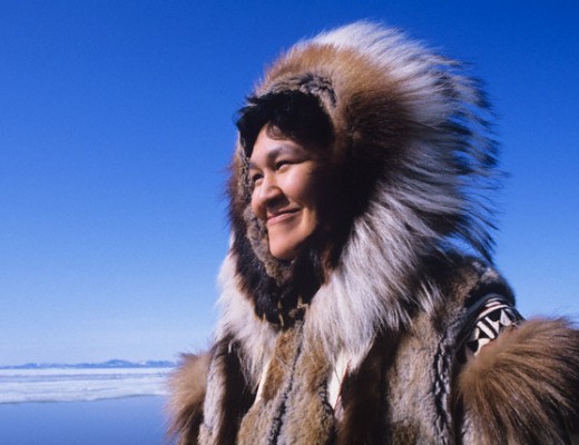 A woman in Native American headgear, which has become popular all over the world. Image by © moodboard/Corbis