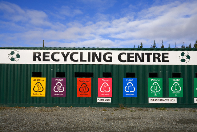 Recycling Center With Bins for Different Materials