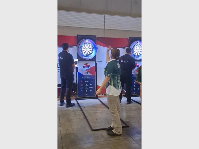 The teen darts star impressed in Seoul, gaining valuable experience and winning a silver medal for SA.