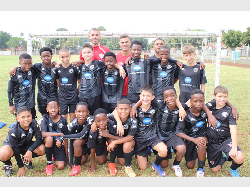 The Alberton Record was invited to the club’s U13 squad training session at their home ground, corner of Basembos and Coral streets, in Mayberry Park, Alberton. The head of football led the session while directors of the club, parents, and supporters cheered in support.