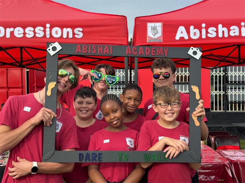 Abishai Academy brings residents together to raise funds for school shoes, supporting learners with dignity and pride.