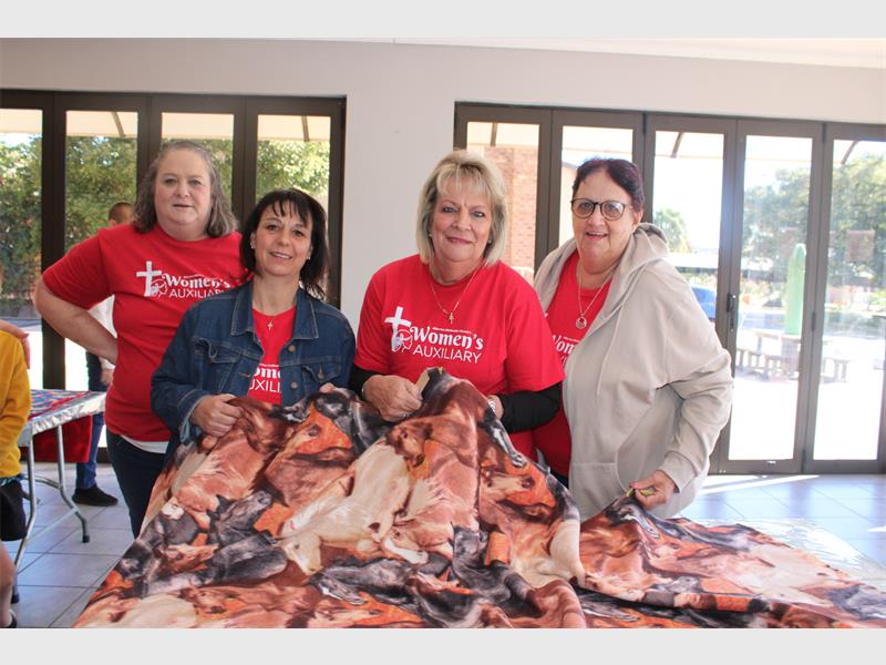 More than 40 women gathered for a morning of fellowship and service as they handcrafted essential and inspirational items to support nine foster children and prepare for future arrivals at the Temporary Place of Safety.