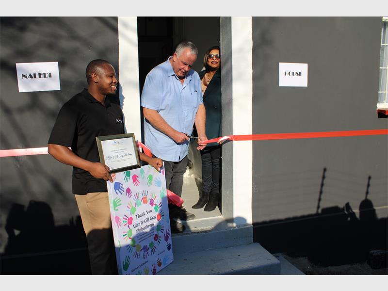 Community celebrates opening of Naledi House to support children in need.