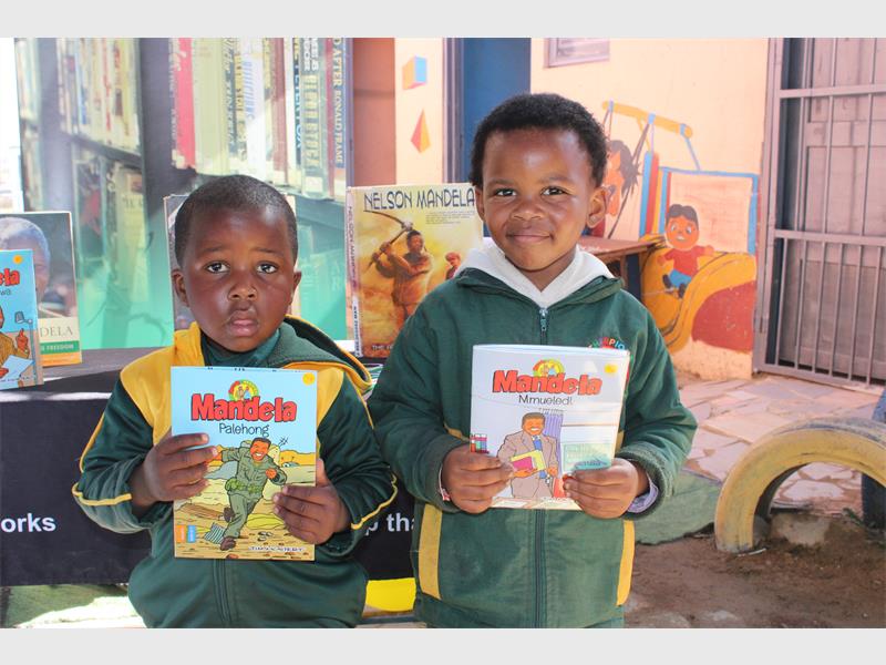 Children and elderly residents gathered at Champions Day Care Centre in Greenfields for a fun-filled Mandela Day celebration that promoted reading and giving back.