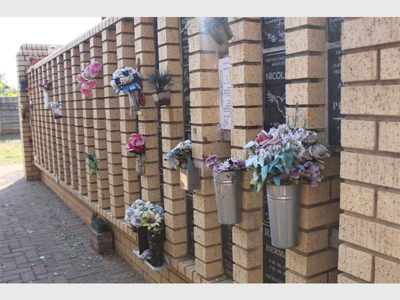 After caring for his late father’s memorial for more than two decades, Leon Brummer says he was shocked to receive a phone call warning that decorative flowerpots attached to the Wall of Remembrance may not comply with City by-laws.