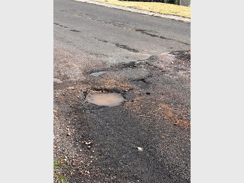 Residents say a water leak in Sandwich Bay, Elandshaven, has gone unresolved for about three months, with the ongoing leak now causing a large and potentially dangerous hole.