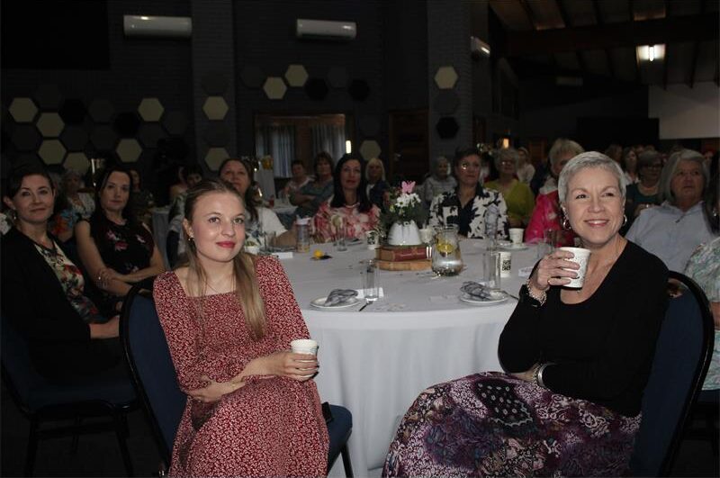 Women gather for an inspiring morning with speaker Melinda Viljoen, MC Carien Botha and musician Janie Bay to support end-of-life care in Alberton.
