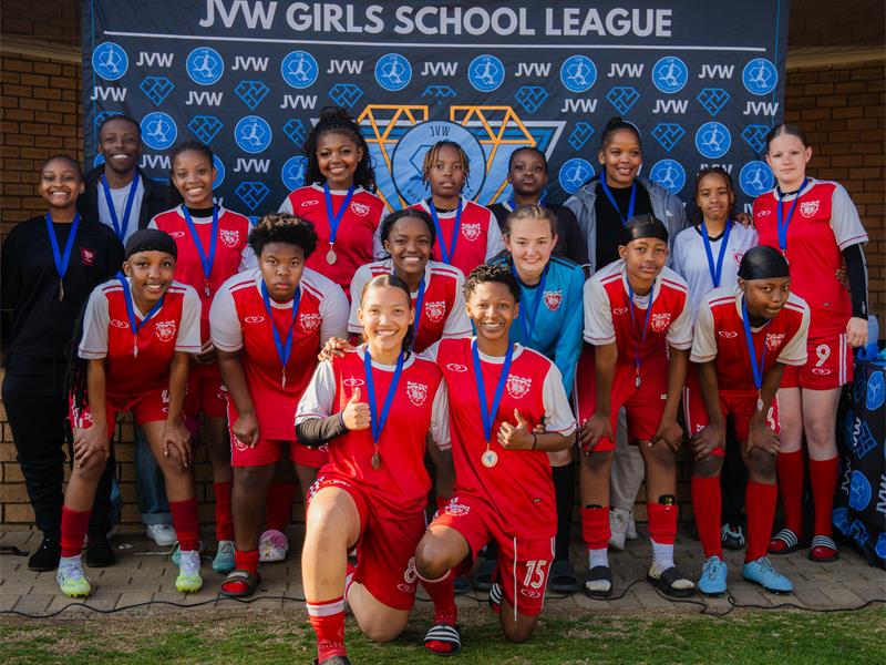 University of Johannesburg hosts 32 schools as Alberton team overcomes injuries and shoot-out pressure.
