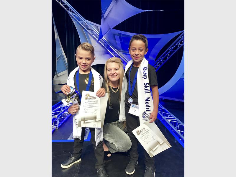 WELL DONE: Commercial model, first runner-up Ronaldo Fernandez, Natacha Thompson and second runner-up skills model, Dominique Esteves.