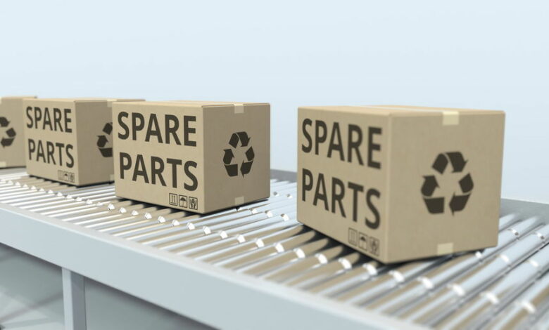 Cartons with spare parts on roller conveyor. 3D rendering