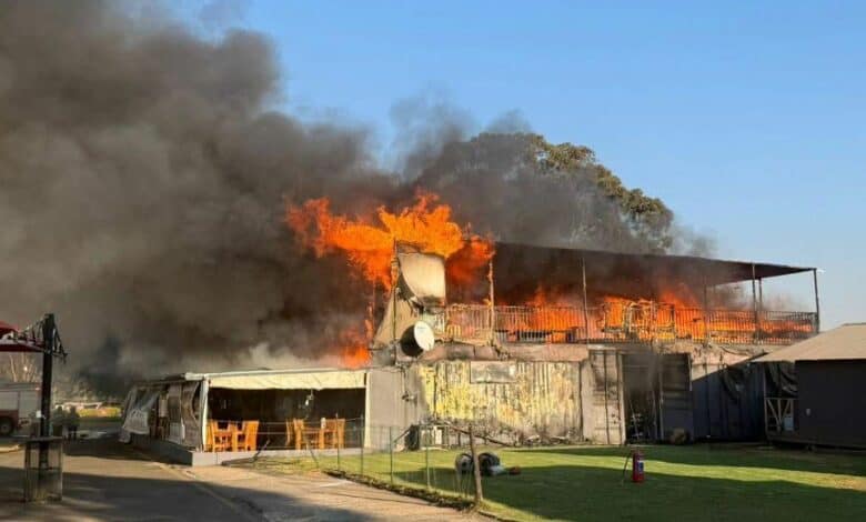 Thick smoke from the early morning fire led to the temporary closure of a nearby road while firefighters worked to contain the blaze.