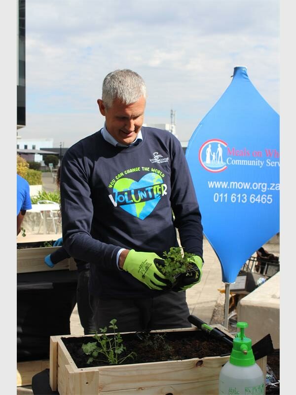 Ulrik Bengtsson plants herbs and vegetables for needy families as part of Sun International’s Festival of Giving, which reached 290 000 beneficiaries nationwide.