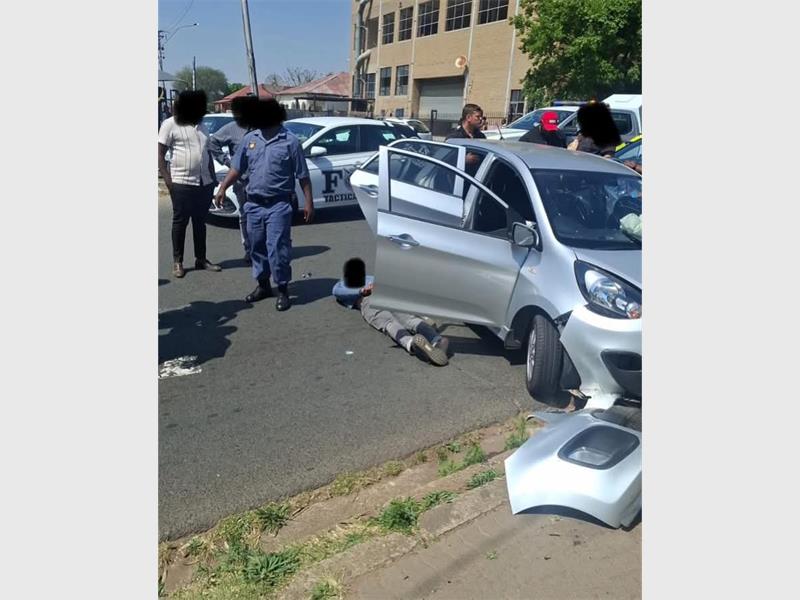 Hijacked vehicle recovered, firearm seized as suspect apprehended.