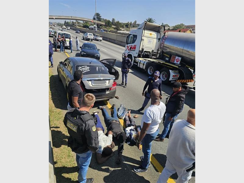 A Toyota Quantum driver was saved when police and security agencies intervened in a hijacking attempt, stopping one getaway car while the other fled.