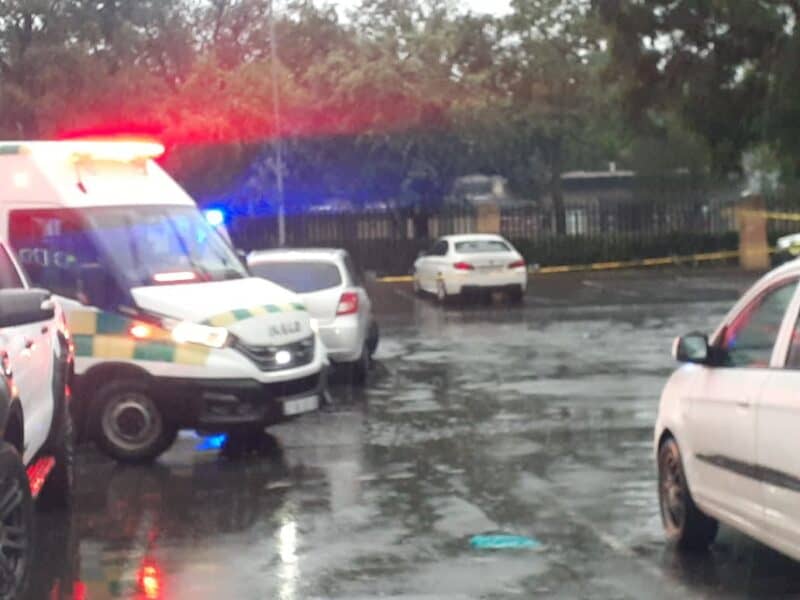 Two men, who were offered a job by a stranger, discovered a woman’s body in a white BMW at Bracken Square, sparking a murder investigation.