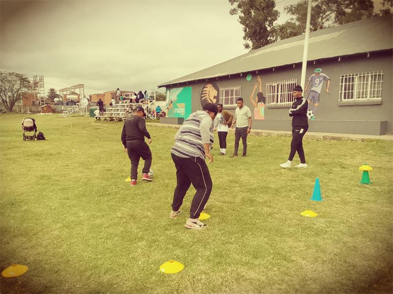 Over two weekends, coaches and community leaders gathered to experience a programme that is shaping lives beyond the sports field.