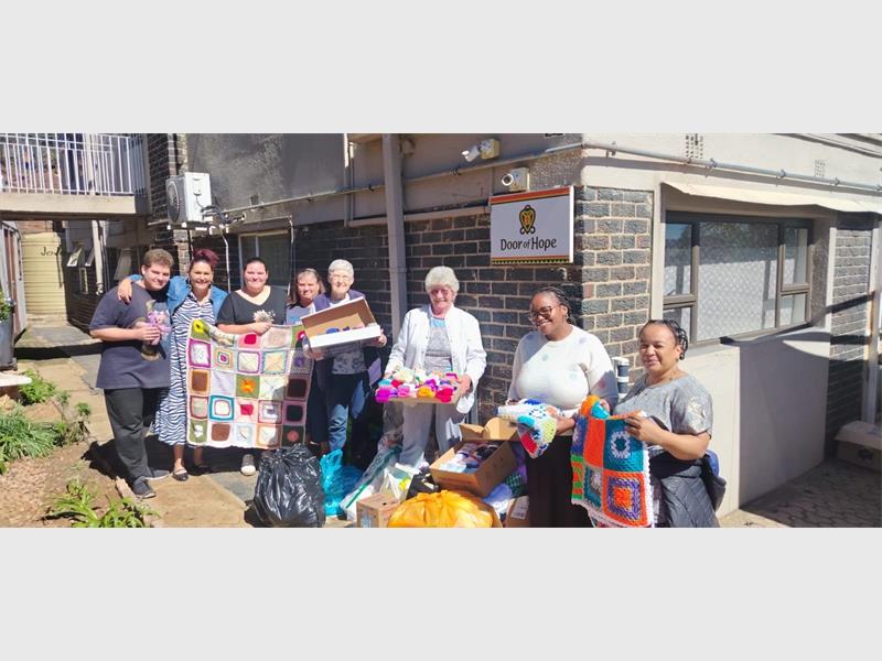 Handmade teddies, blankets and winter wear are being donated by local groups to bring warmth and comfort to those in need through the Door of Hope initiative.