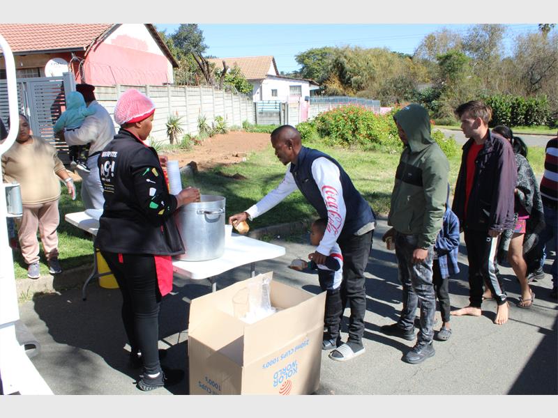 Volunteers call for equipment and support to keep community feeding project running.