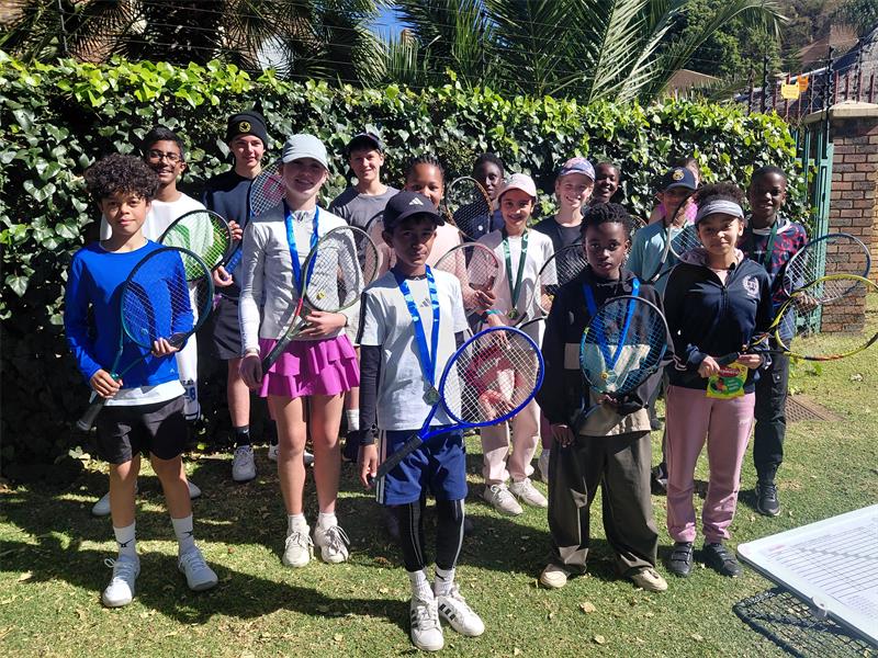 Young tennis players grow their skills.