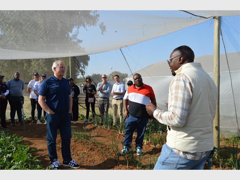 Former All Blacks captain leads Laureus delegation to Johannesburg South project, where sport, education and practical skills are helping young people build confidence and opportunities.