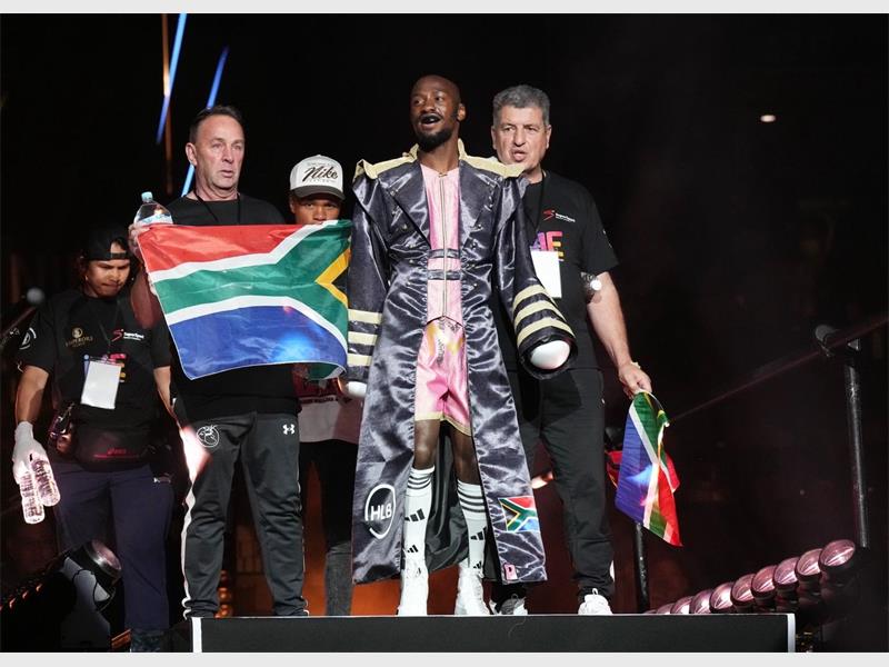 South Africa's 'Magic Man' overcame an early cut to defeat Japan's Tomoya Tsuboi on points on a historic day for local boxing.