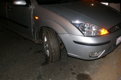The car skidded, hit the pavement and ended up sideways in the Klipview Road. 