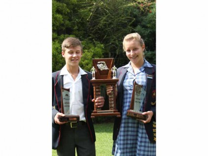 Chanté Rademan and Mathew Muller received the trophy for the most outstanding contribution to swimming (large trophy).