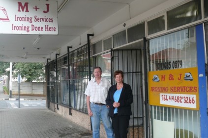 The outside of the businesses.
