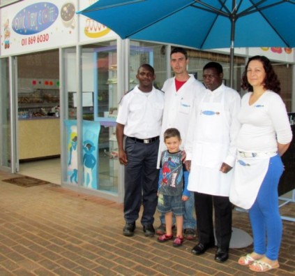 SPCA Inspector Henry Adegbite, Darron and Argiro Prince with their son Alexander and Lovelex.