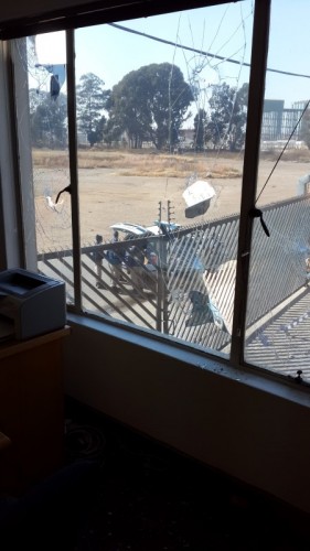 SAPS arrived to escort staff from the offices after the attack. 