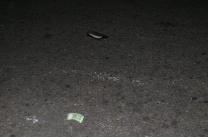 One of the victim’s shoes, after she was hit and flung into the road.