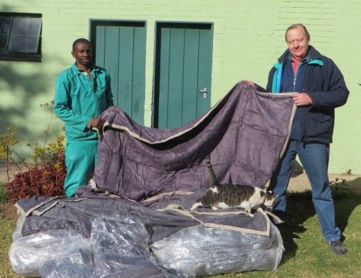 Elvis Potwana (AACL) and Mr Peacock of the Rotary Club of Sandton.
