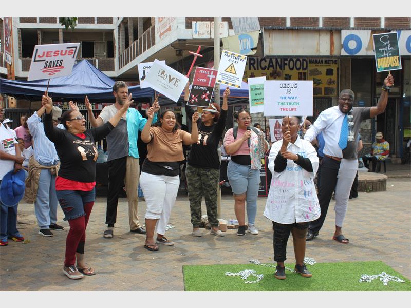 Churches and community members walked through Main Street in a united stand against drug and substance abuse, ending with prayer, encouragement, and support initiatives.