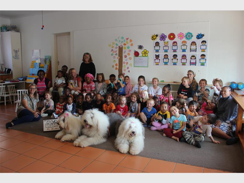 Jade, Orion and Yoyo delighted the children with their tricks while helping them learn how to treat animals with care and respect.
