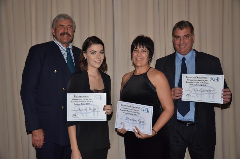 AHI president, Ben Deysel congratulates Louise Verrips of Armani day SPA, Charmaine Roodt of FNB Galleria and Karel Frackers of Newcastle on their wins.