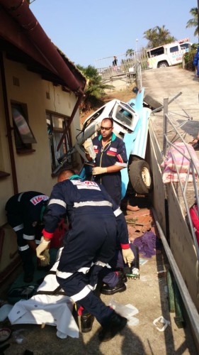Paramedics treat the injured in Gus Brown Road.