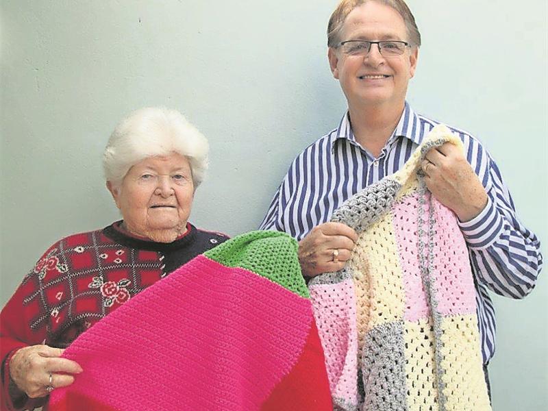 Knit Wits donate blankets to Hospice South Coast Sun