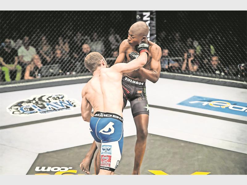 Bout 12 : Nkazimulo Zulu vs Craig Ninow an EFC Flyweight Championship at the Durban ICC, Durban on 27 August. PHOTO: Ruby Wolff / EFC Worldwide 2015