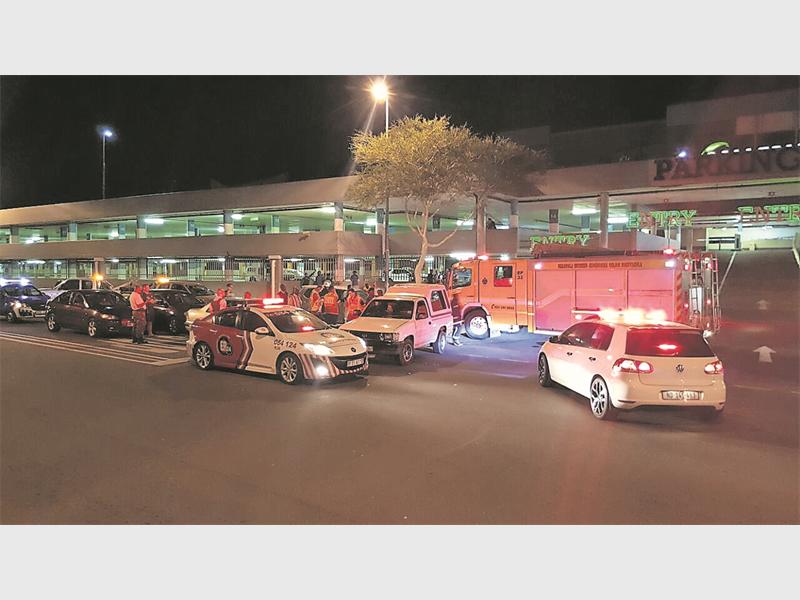 Paramedics and firemen tend to the injured after a collision on Arbour Road on Sunday night, 10 April.