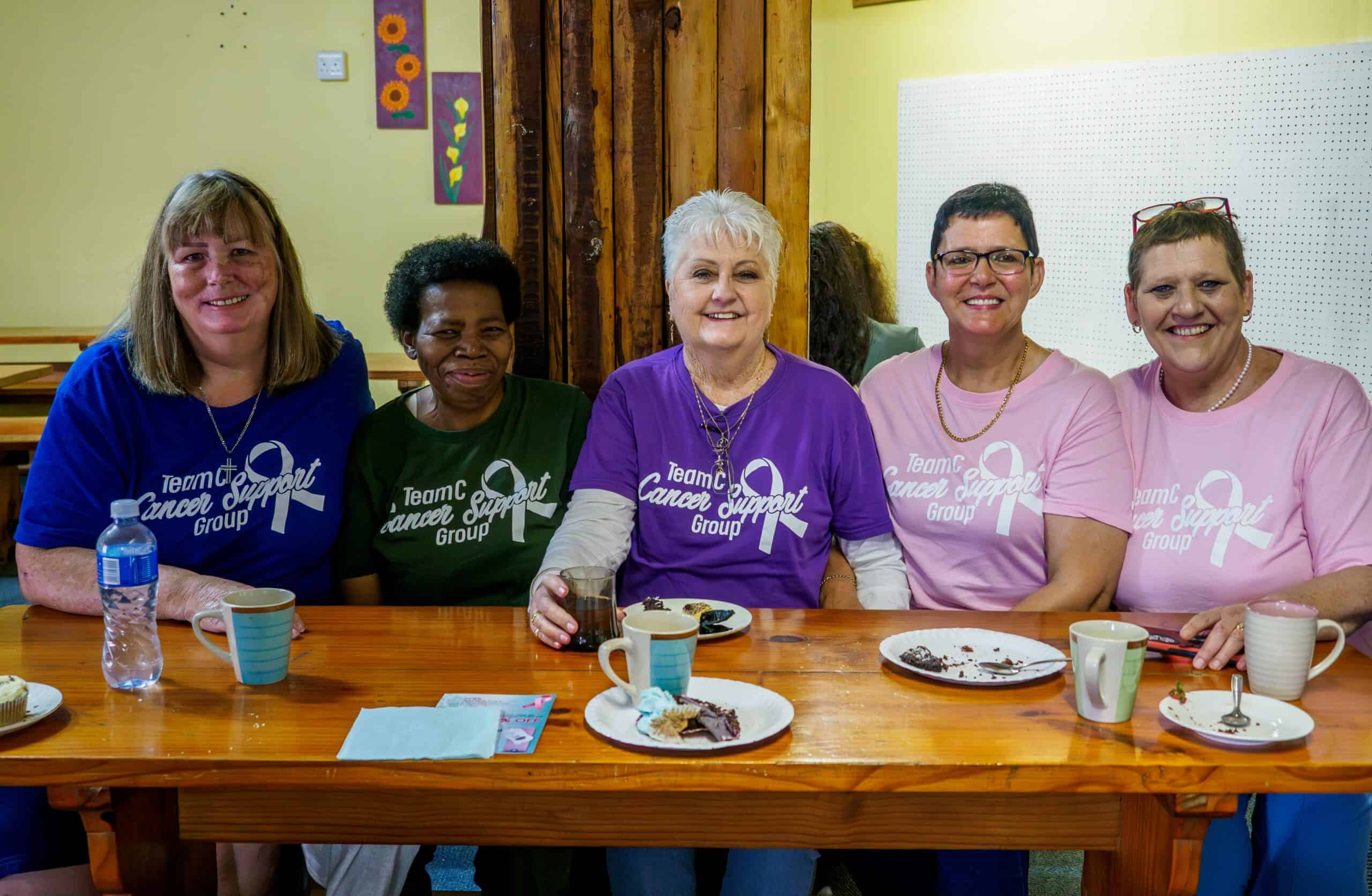 A group of cancer patients in a support group meeting