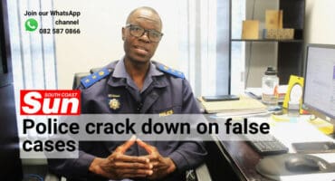 A police officer at his desk.