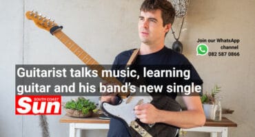 A guitarist strums a tune.