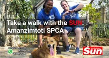 Two women and a dog.