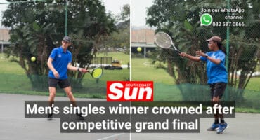 Two tennis players competing.