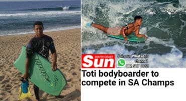 a bodyboarder on the beach and in the sea