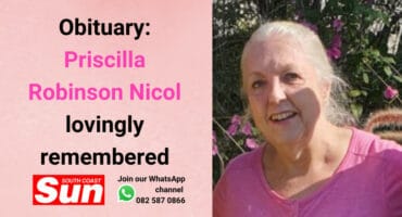 An elderly woman smiling